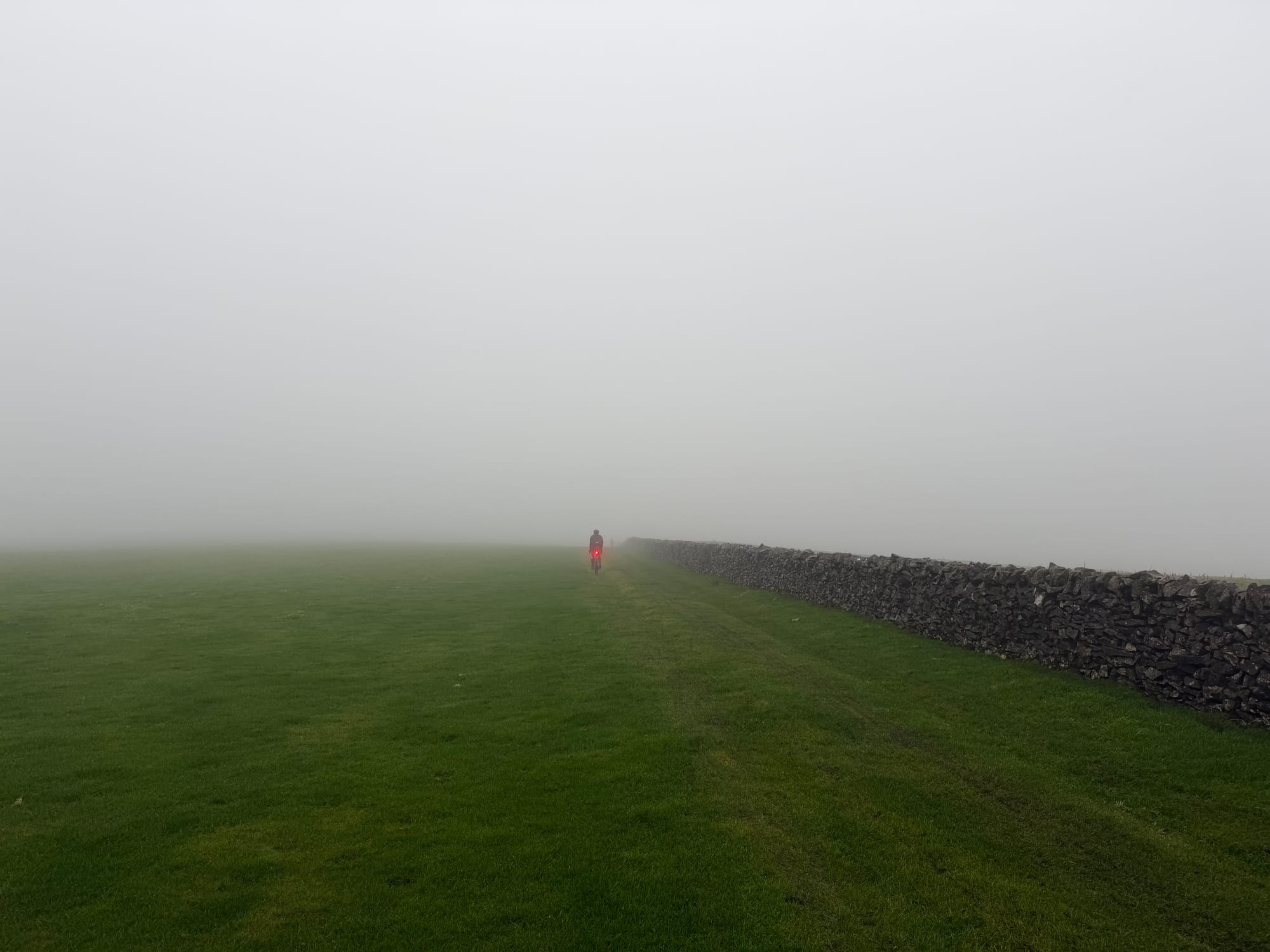 The route across a misty field